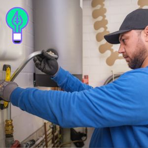 een man die een warmtepomp installeert